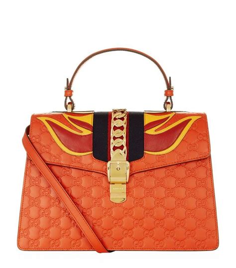 sylvie gucci signature bag with flames|Gucci Sylvie Flame Shoulder Bag In Red Signature .